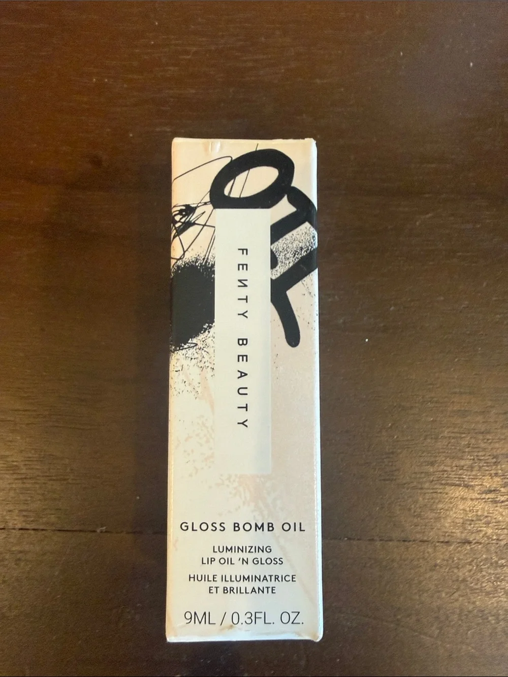 Fenty Beauty Gloss Bomb Oil in razzberry jamz Luminizing Lip Oil